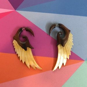 Fake gauge earrings.